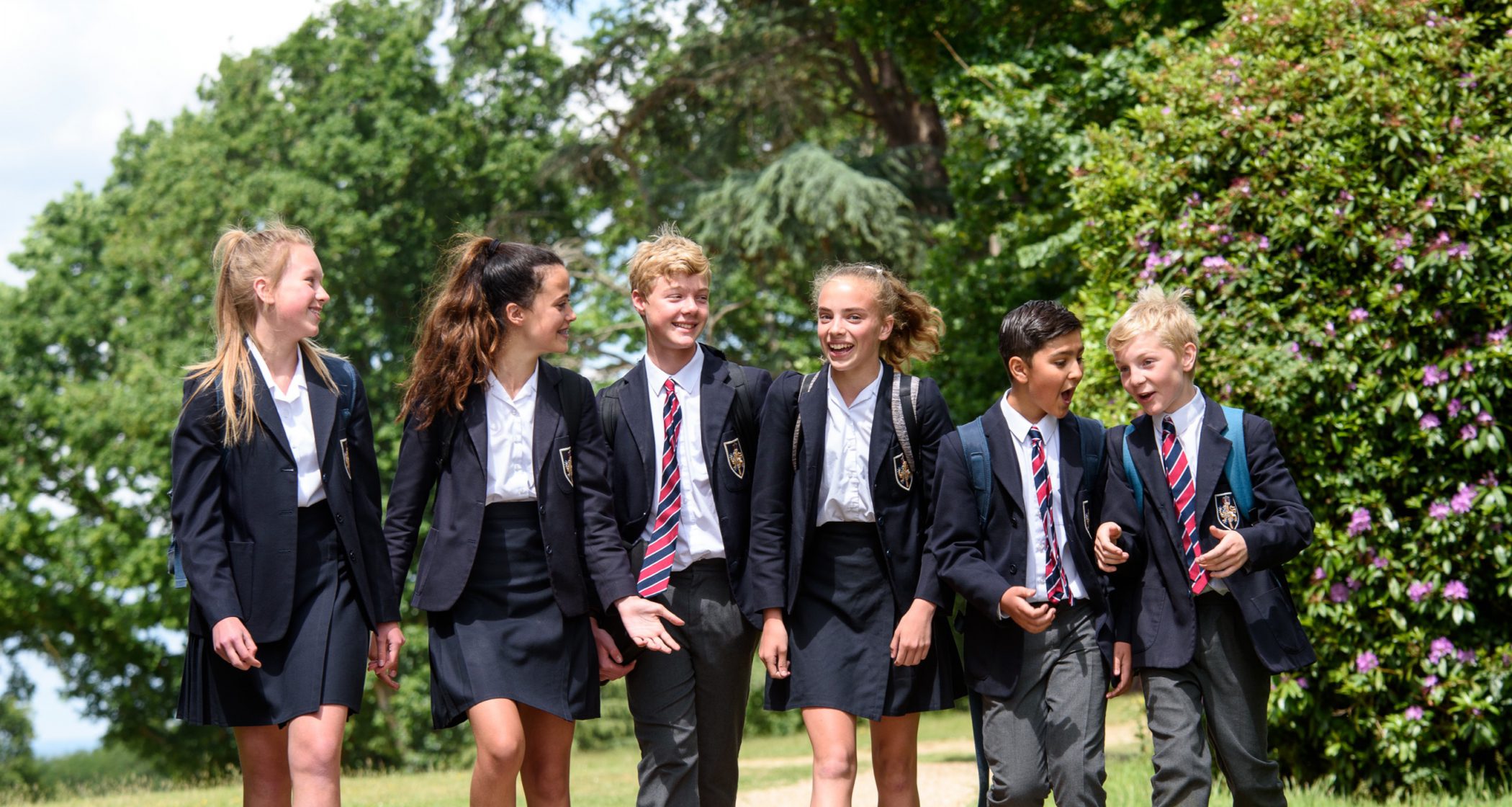 Young pupils talking in a group