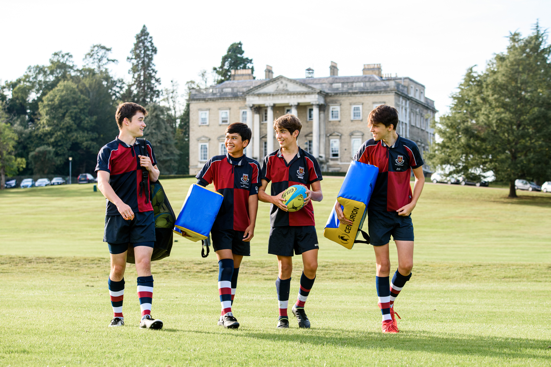 Rugby with mansion in background