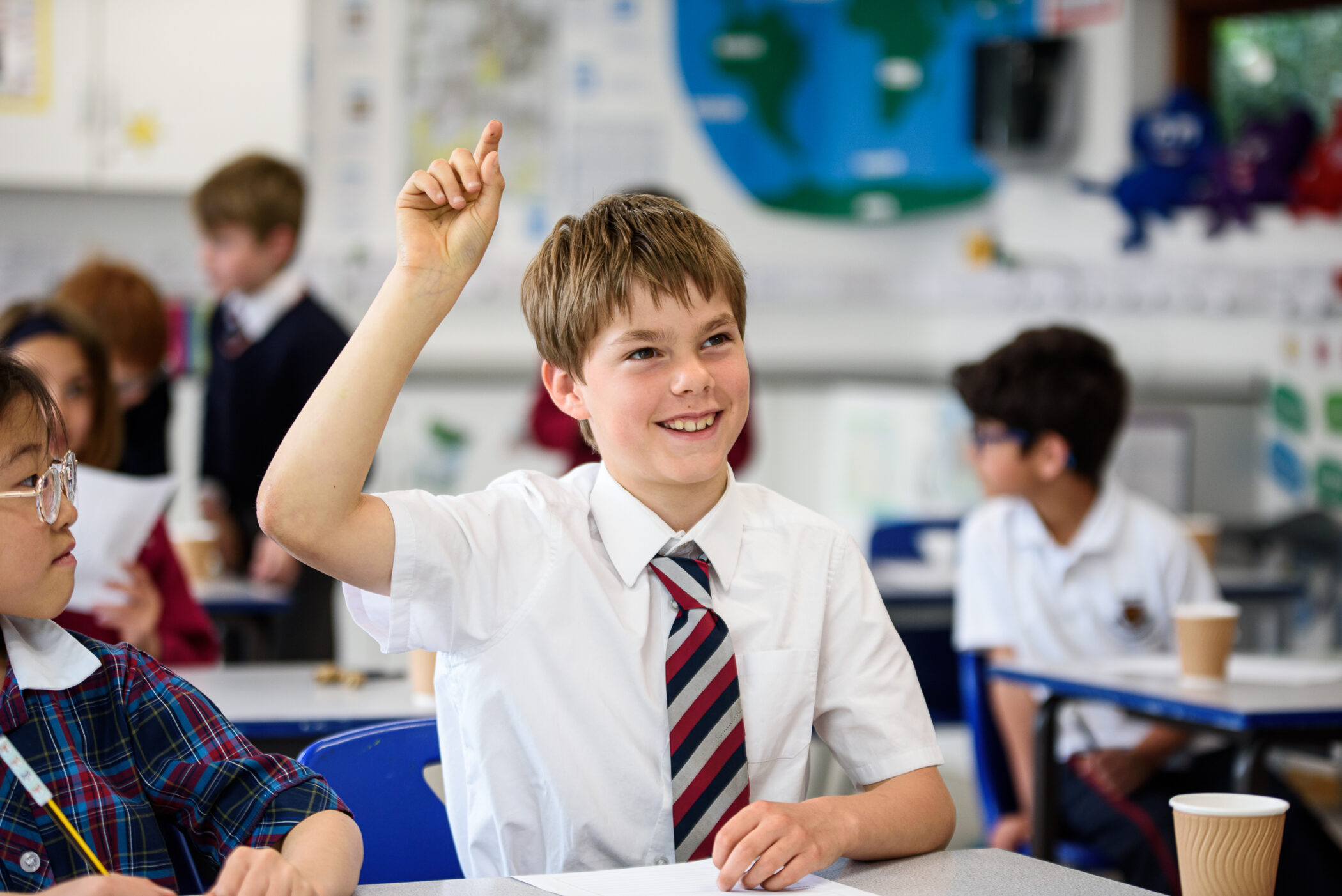 Prep pupil raising hand